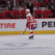 Alex DeBrincat #93, of the Detroit Red Wings scores with 1.5 seconds in the first period against the Chicago Blackhawks